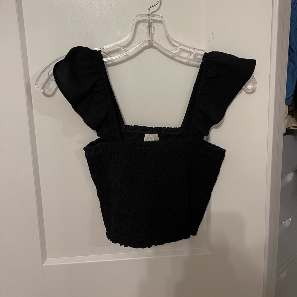 MP|C black ribbed crop top.